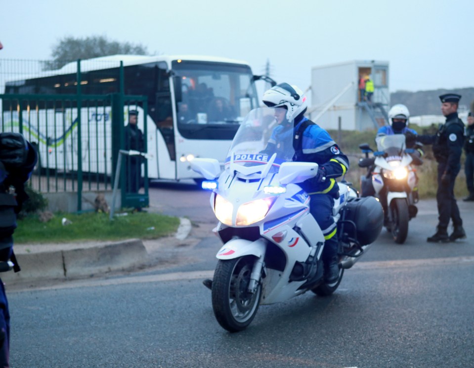  The first coach leaving Calais with migrants from 'The Jungle'