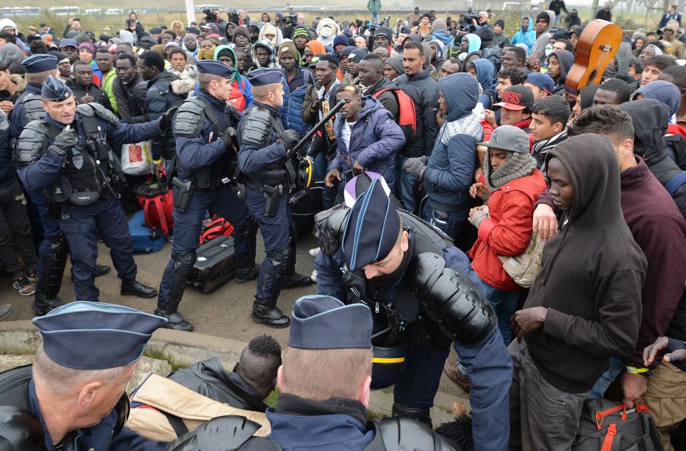  There were chaotic scenes in Calais today as thousands of migrants queued to leave The Jungle