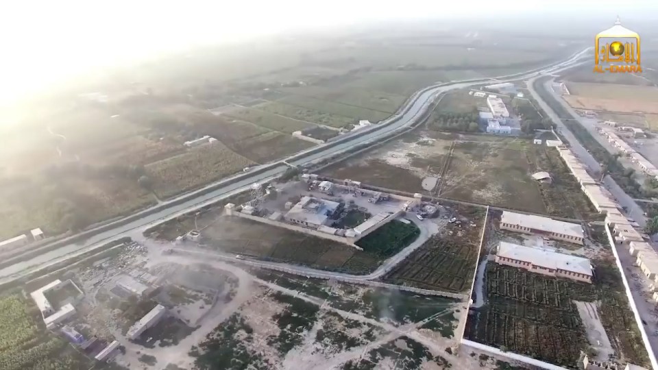  Target... The police base before the suicide bomber strikes. The Humvee can be seen on the road to the south of the base