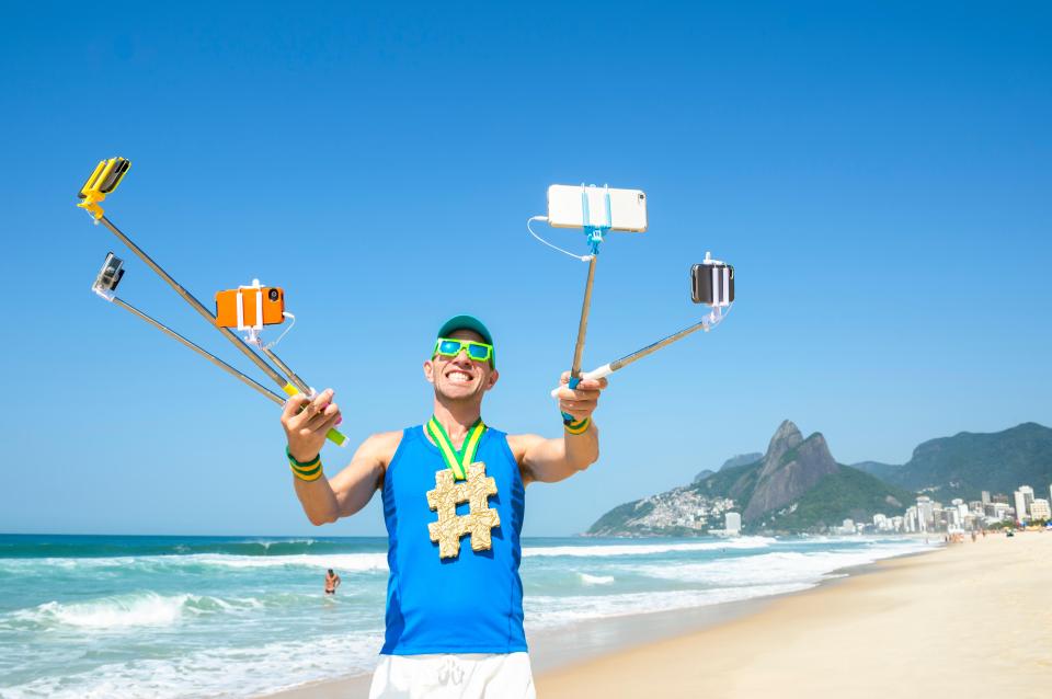 four phones on beach