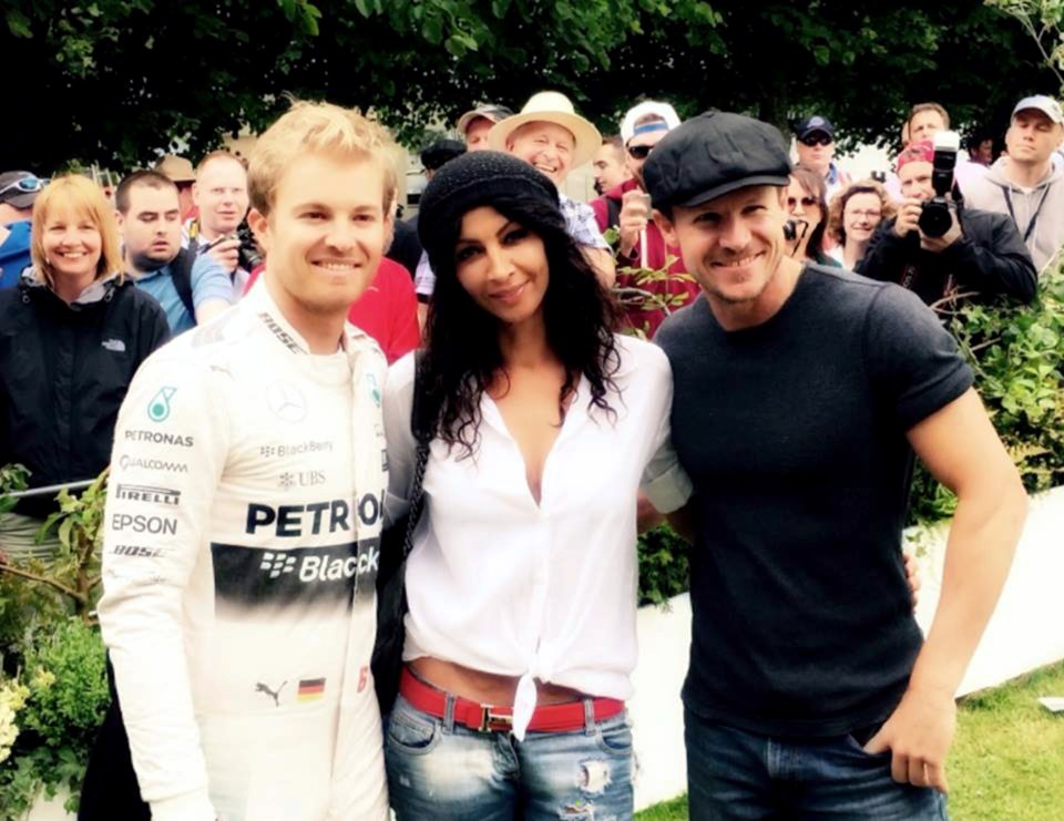  Pictured is Felix Baumgartner (right), his wife Mihaela, and Mercedes F1 star Nico Rosberg