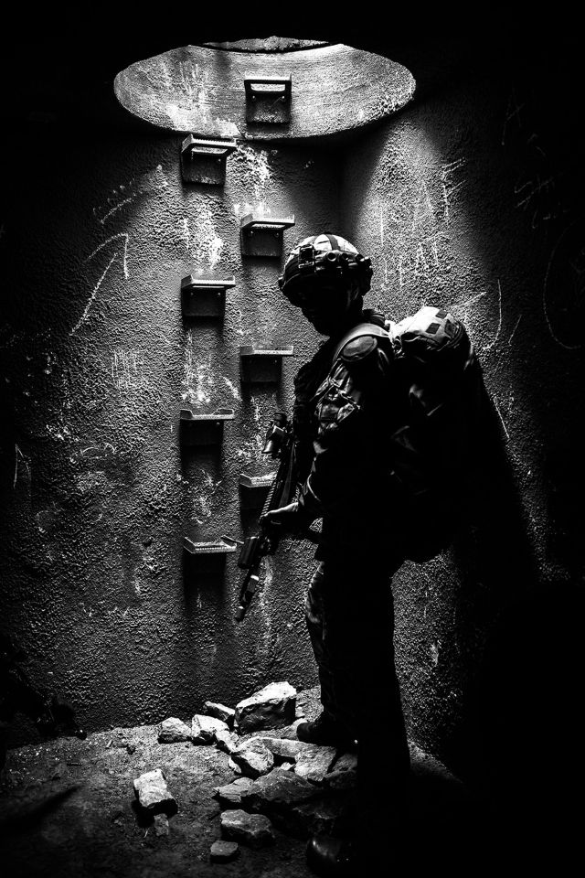 Bombardier Murray Kerr RA captured this image of a soldier contemplating stair rungs with the photograph released by the Ministry of Defence