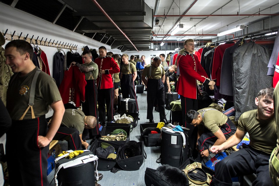 Sergeant Rupert Frere RLC captured this image of soldiers suiting up into their formal Redcoats