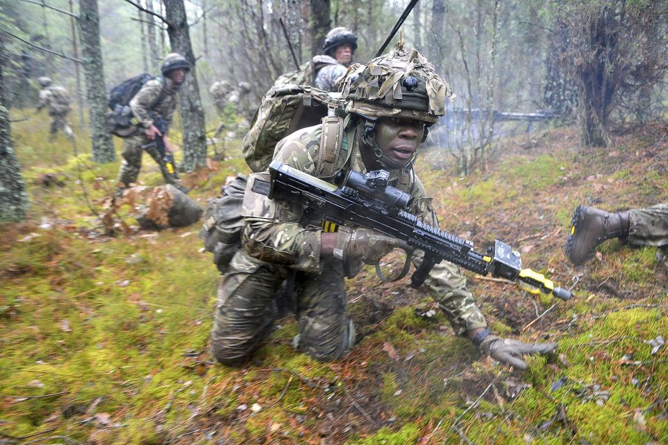 British, Lithuanian and Canadian troops rehearsing joint operations on NATO's Exercise