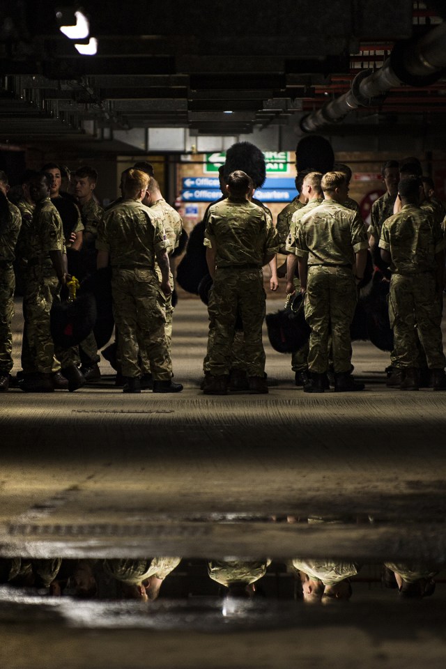 Soldiers receive a briefing in this image, with Sergeant Rupert Frere RLC's photograph just one of many recognised in the Army Photographic Competition