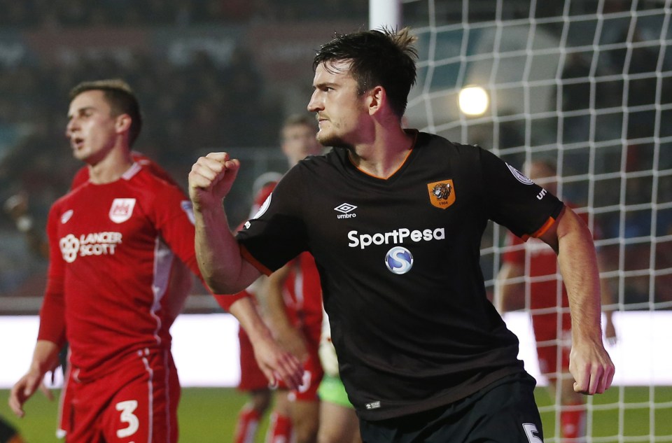  Harry Maguire celebrates putting Hull in the lead at Ashton Gate