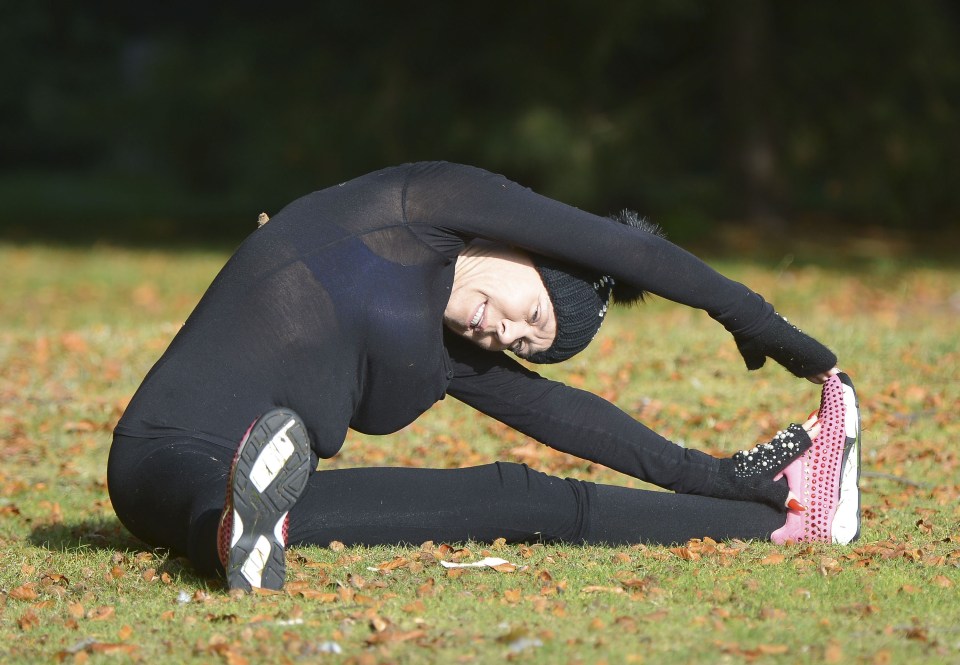 She even sat down on the grass to continue her routine