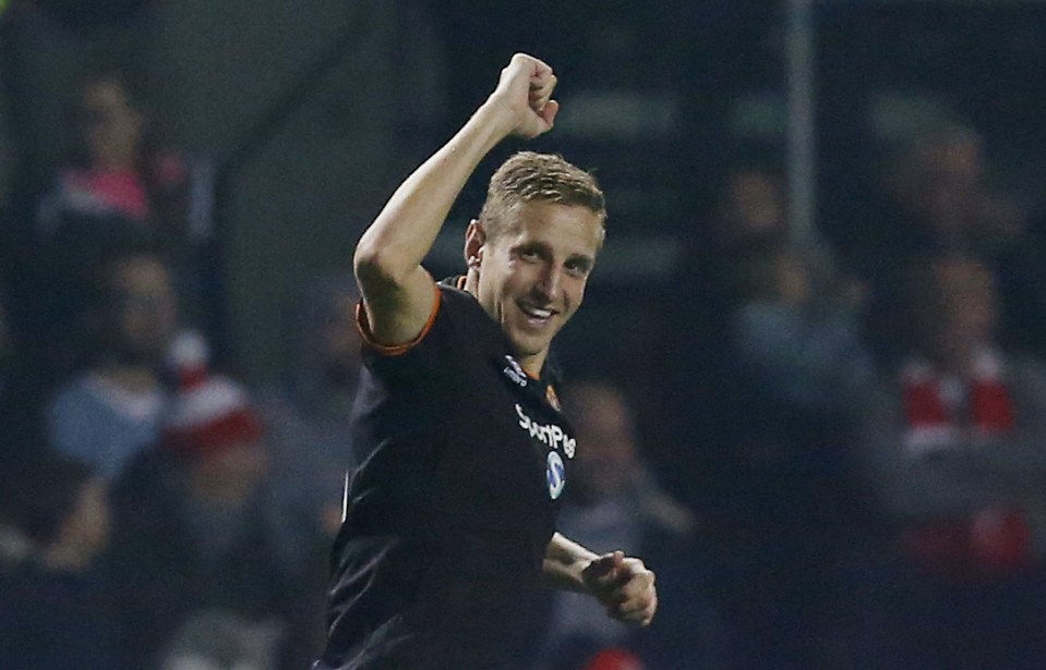  Michael Dawson celebrates scoring Hull's second of the game