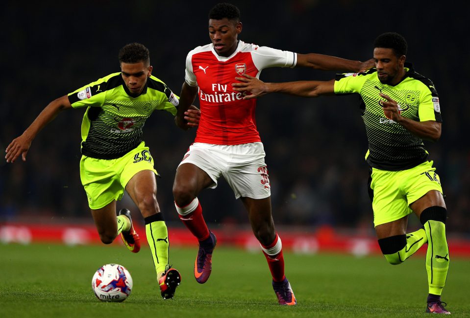  Jeff Reine-Adelaide holds off two Reading players