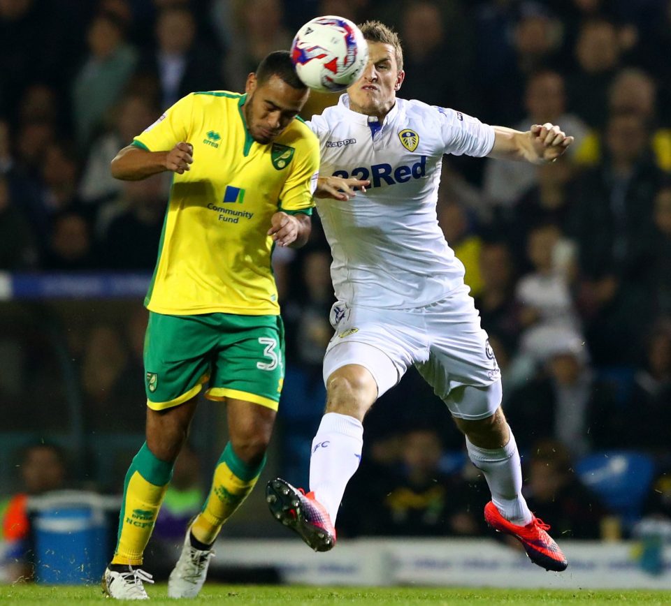  Martin Olsson tussles with Lees frontman Chris wood before the all-Championship tie went to extra time