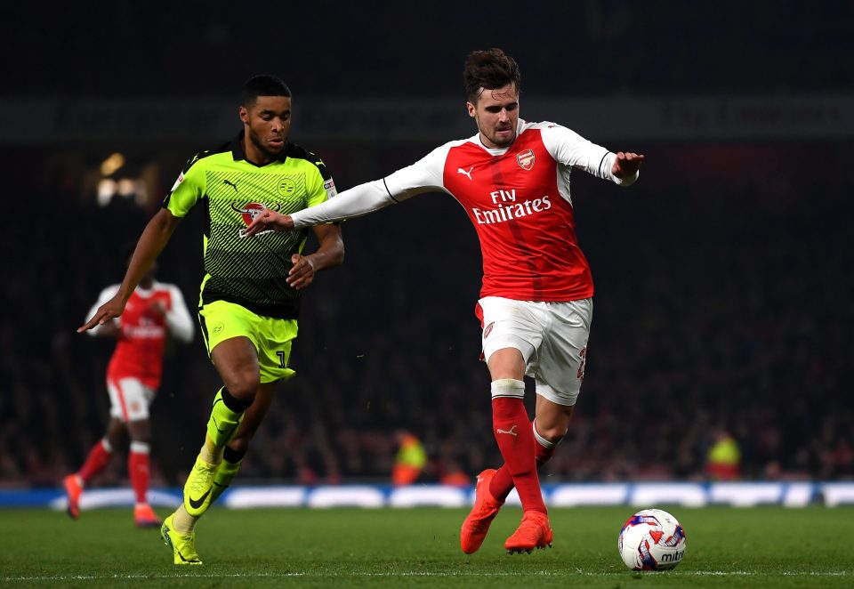  Carl Jenkinson (right) impressed in his first Arsenal match for almost three years