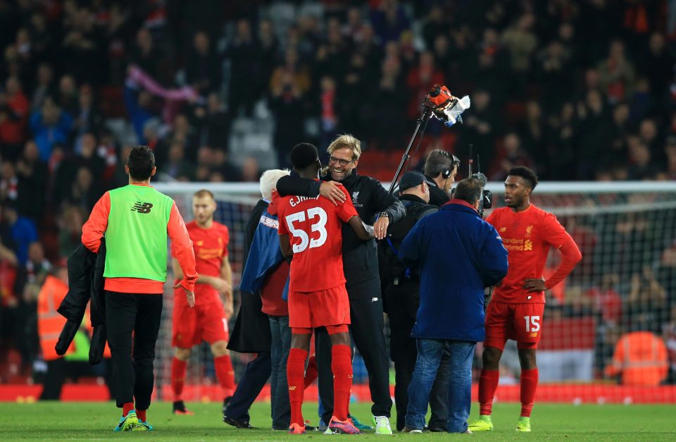  Jurgen Klopp celebrates with another young talent Oviemuno Ejaria