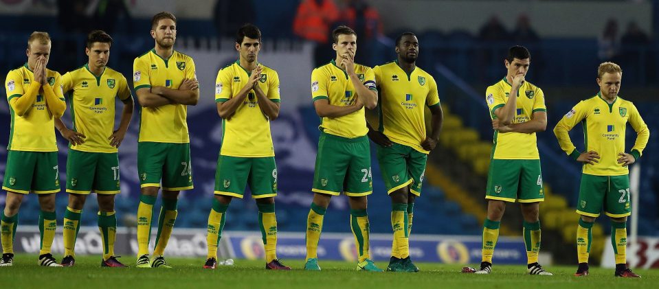  Norwich players watch on as Leeds sneak into the quarter-finals in a shootout