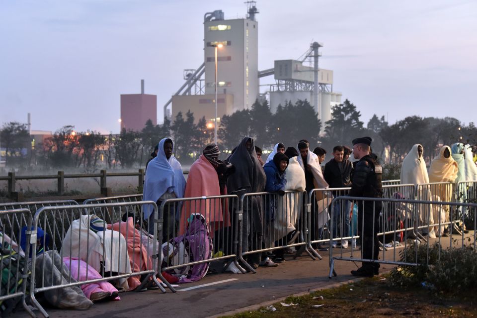  Unaccompanied children are being taken to a safe area of the camp whilst it is demolished