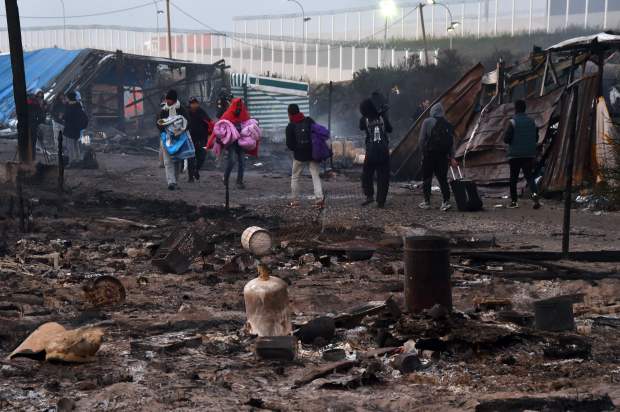 The demolition of the camp has begun and over 8,000 people are being evicted