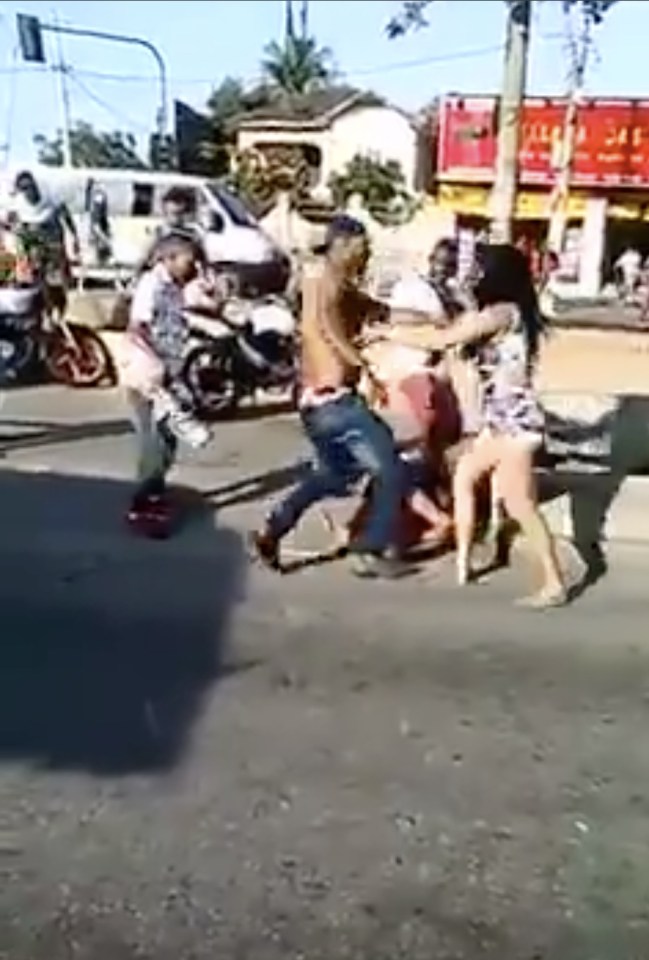  A friend comes to help the defenceless woman but it beaten in the face with a weapon