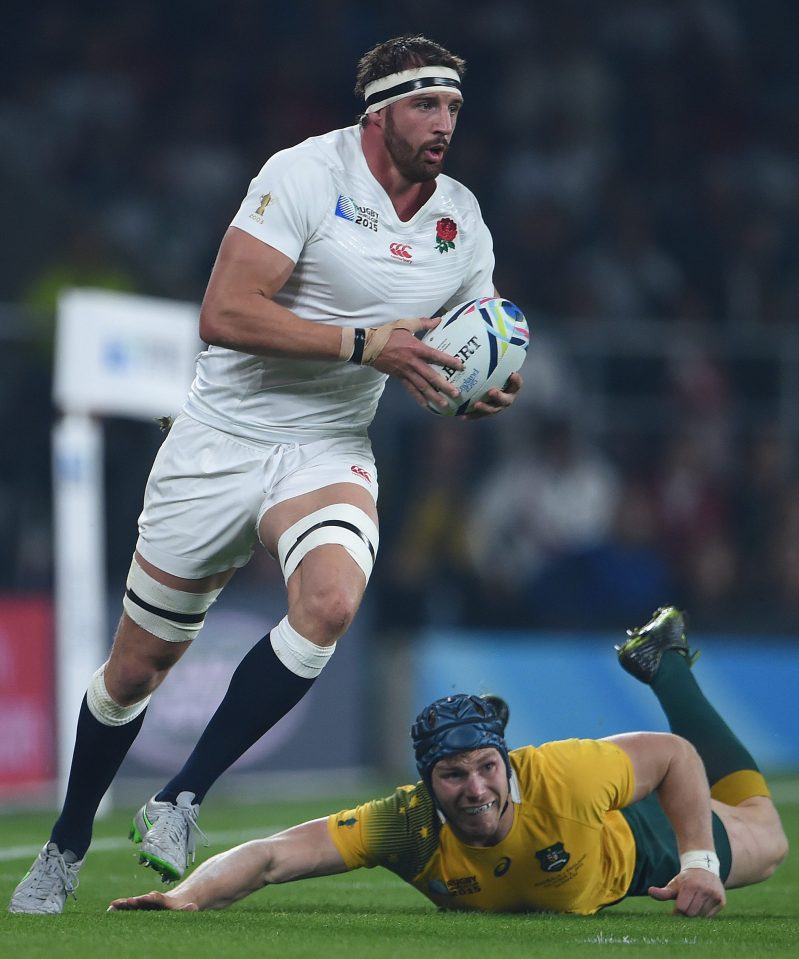 Tom Wood tangles with Australia star David Pocock during the World Cup group game last year