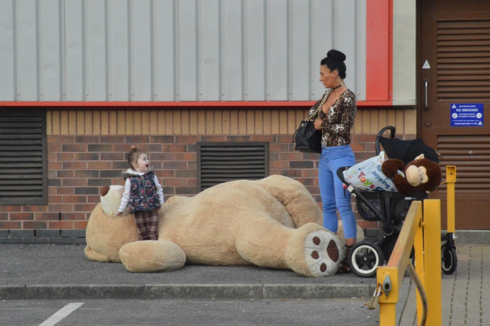  The little one couldn't help but want to play with her new friend before she had got it home