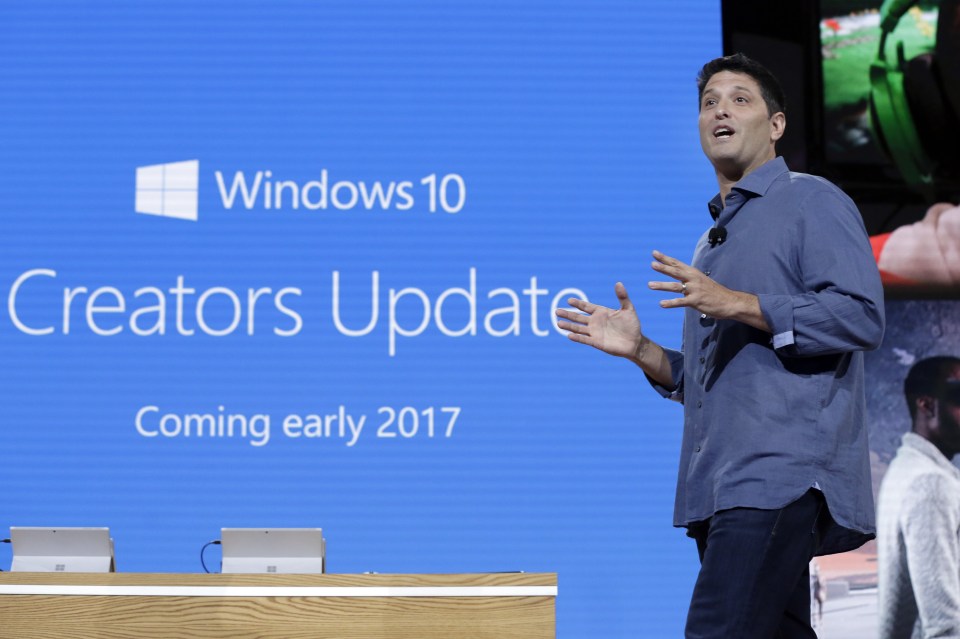  Terry Myerson, Microsoft's executive vice president of the Windows and Devices Group, discusses a Windows 10 update at a Microsoft media event in New York