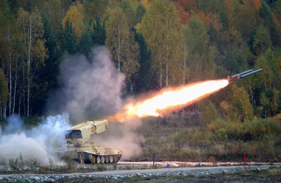  A Russian TOS-1 Buratino multiple rocket launcher fires during the "Russia Arms Expo 2013" 9th international exhibition