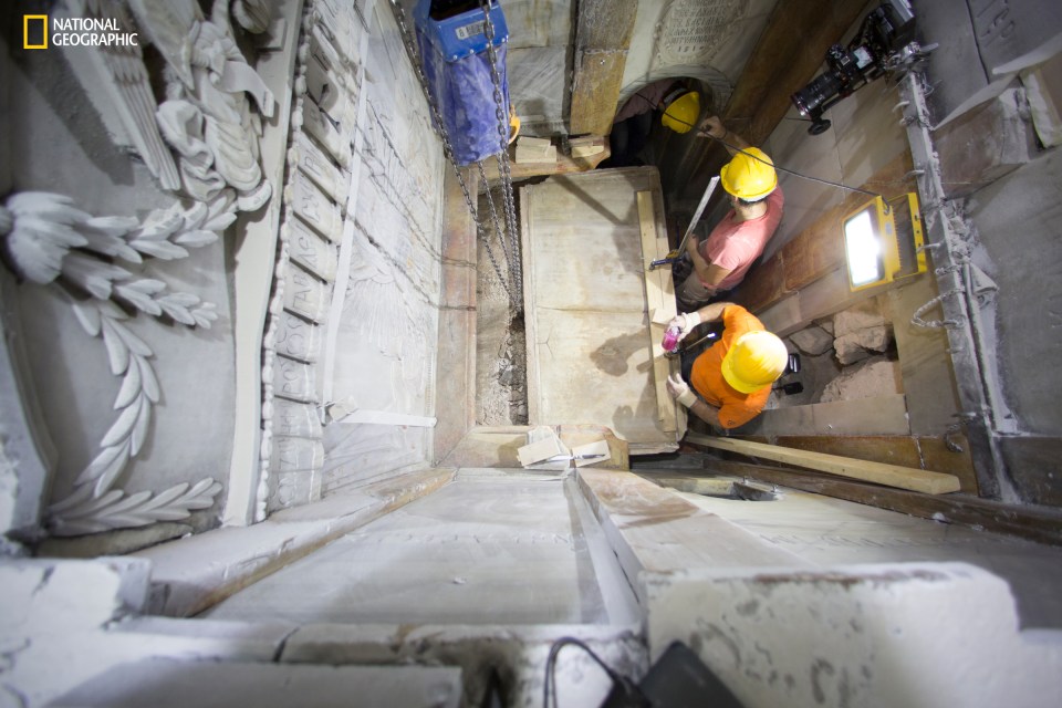  Big reveal ... Workers remove the top of the tomb of Jesus Christ in the Church of Holy Sepulcher in Jerusalem