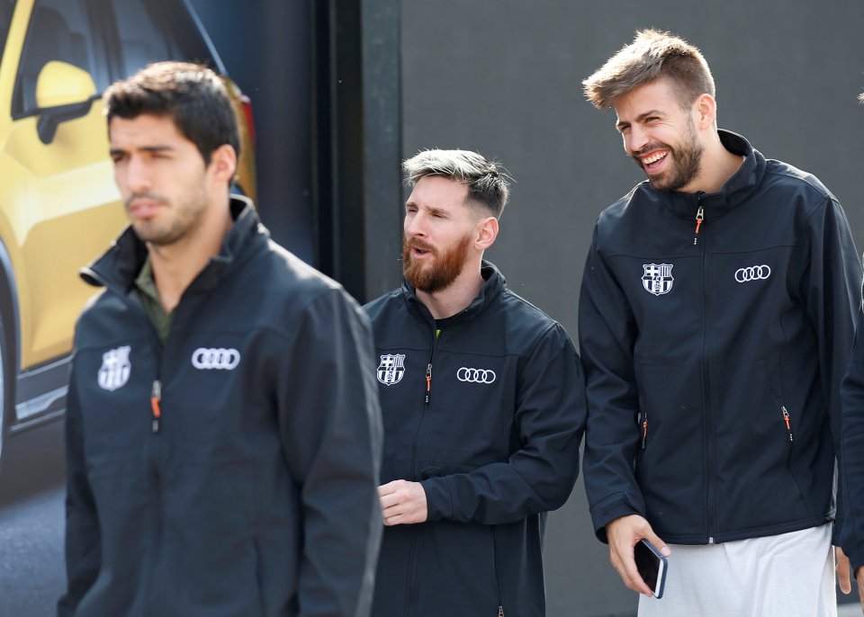  Even though he's injured, Pique seems happier than Messi and Luis Suarez to be attending the shoot