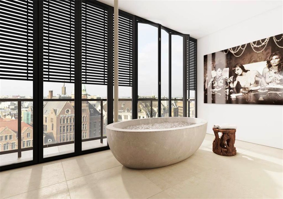  The bathroom features a luxurious suite