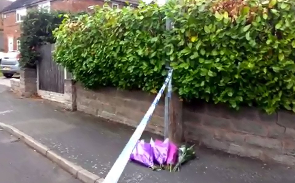  Flowers have been laid outside the property as cops investigate this morning