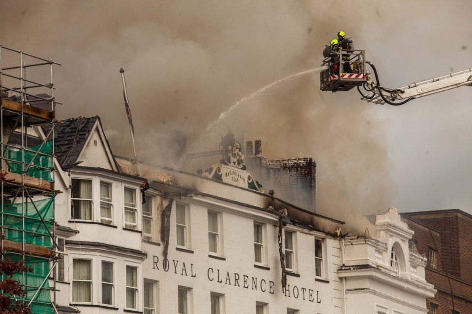 Aerial platforms joined the effort to douse the massive blaze but the fire continues to burn this afternoon