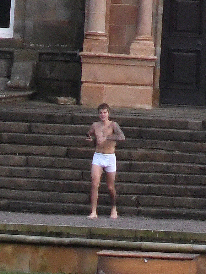  Justin looked happy as he ran down the impressive stone steps