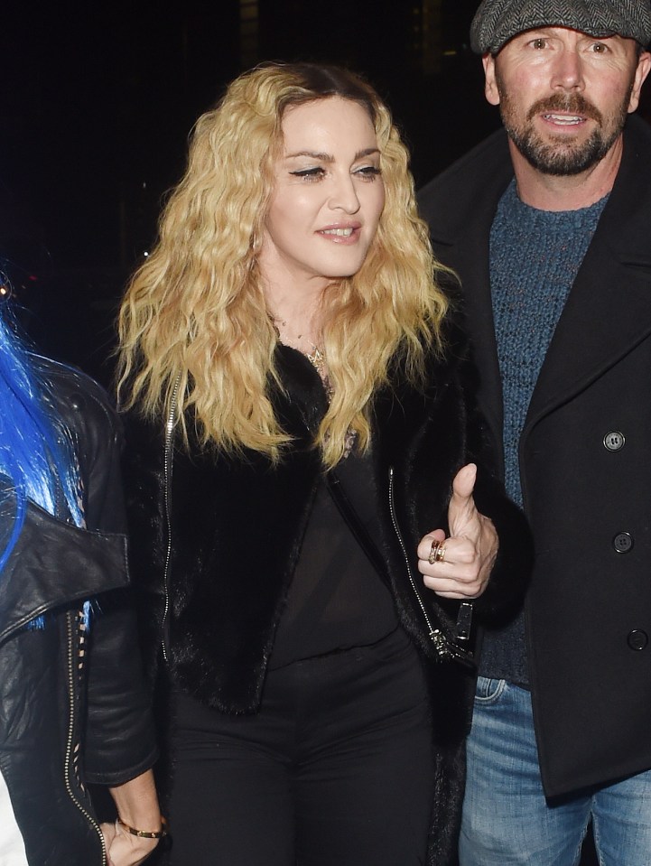  Madonna was in good spirits as she headed to the party, but she didn't dress up