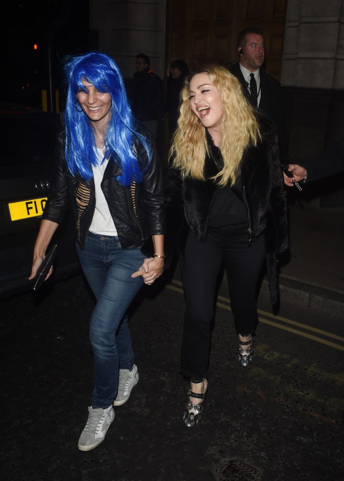  She was seen laughing with her friend who wore a blue wig