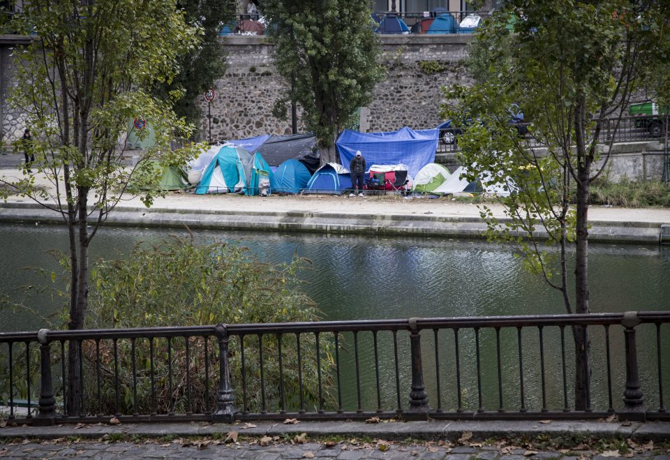  Home from home ... makeshift camps have sprung up on the banks of the Seine in Paris over the last week as Calais was cleared