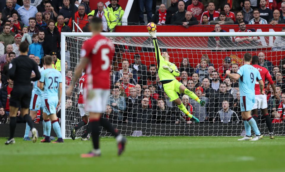  The skipper makes an acrobatic save from a Jesse Lingard header