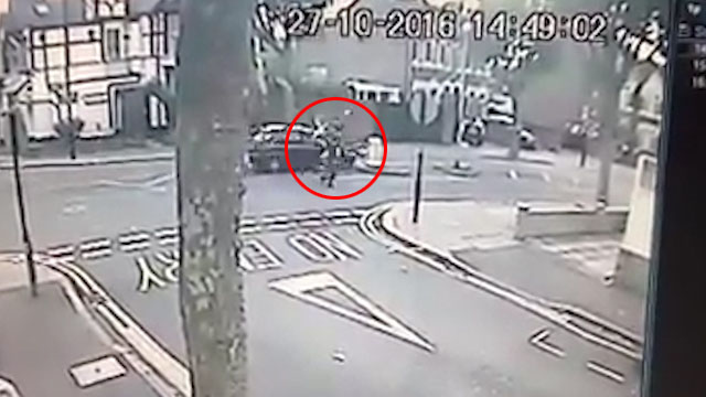  The hurtling car sends the woman and two children flying into the air