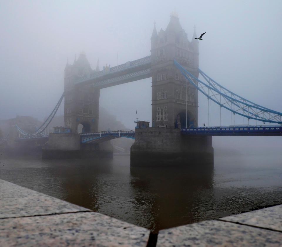  Tower Bridge seen through the mist this morning as London was enshrouded in thick fog for a second day