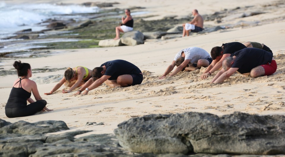  The session saw them posing and stretching in a series of familiar yoga moves