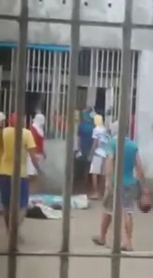 The horrifying moment Brazilian inmates behead a prisoner... and play football with his HEAD