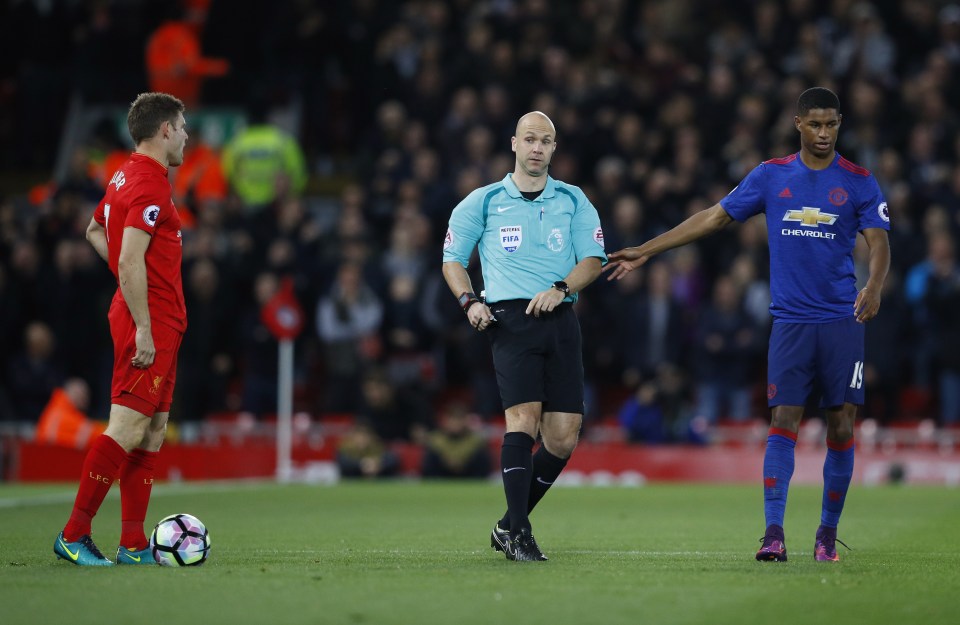  James Milner reacts to being fouled by Utd ace Marcus Rashford in a dour draw