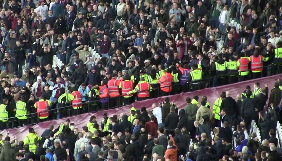  The opposing fans clash at the London Stadium