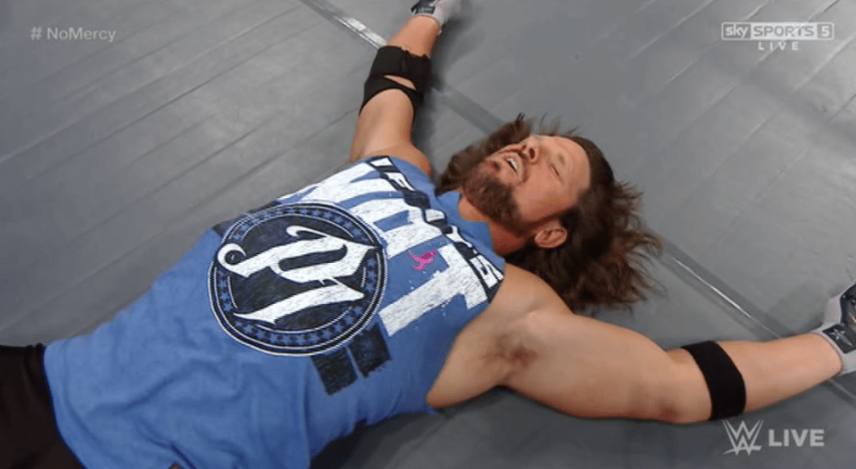  Reigning champ AJ Styles was hit with Dirty Deeds