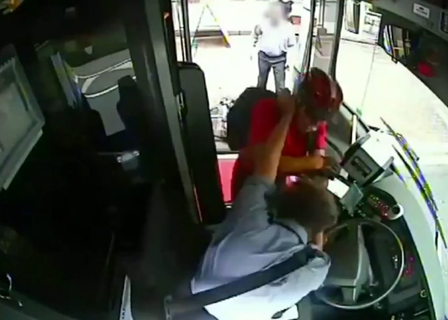  The bus driver bravely fights back before his attacker flees on his bike