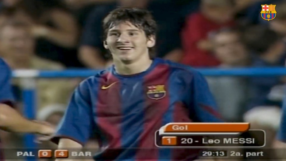  A baby-faced Messi celebrates scoring his first goal for Barca