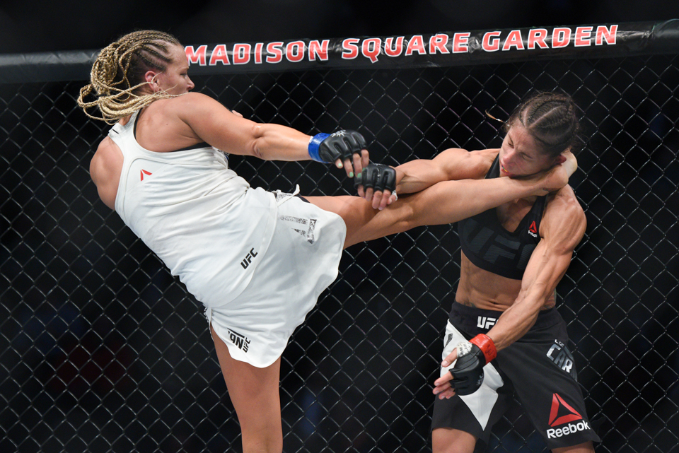  Katlyn Chookagian connects with a head kick