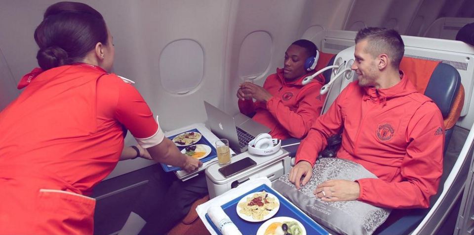  French duo Anthony Martial and Morgan Schneiderlin chill out on their flight to Istanbul