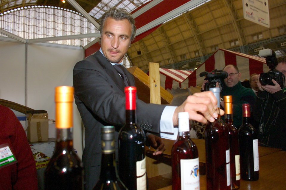  Drinking fan David Ginola enjoys himself at a wine festival