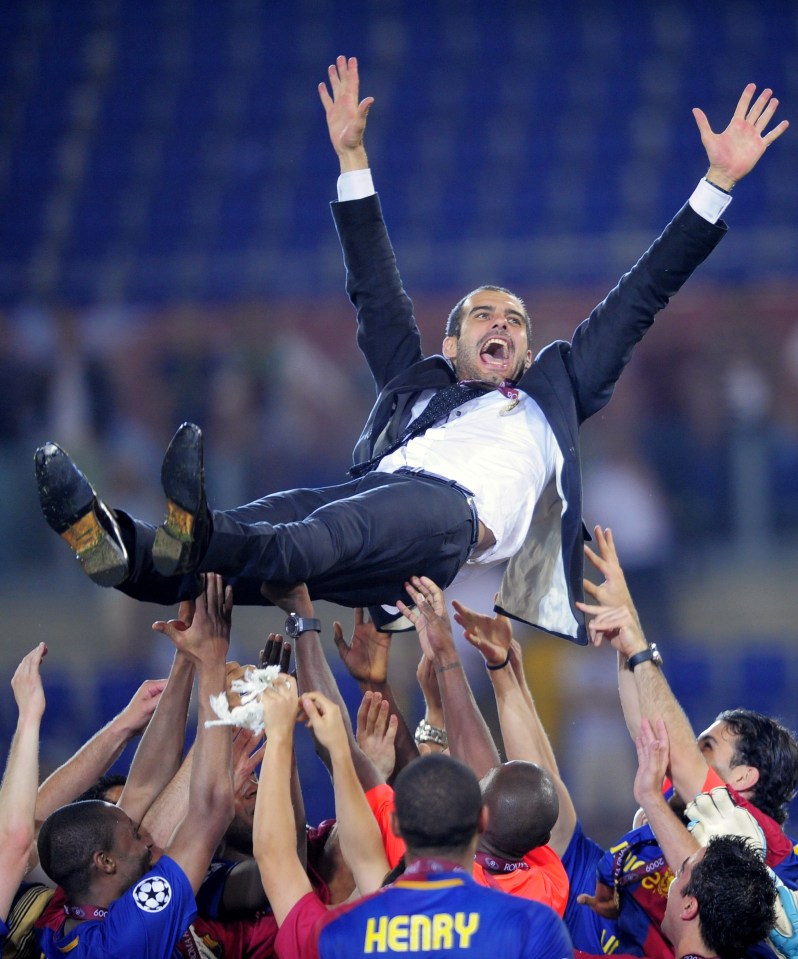  Pep Guardiola is thrown in the air as Barcelona celebrate 2009 Champions League