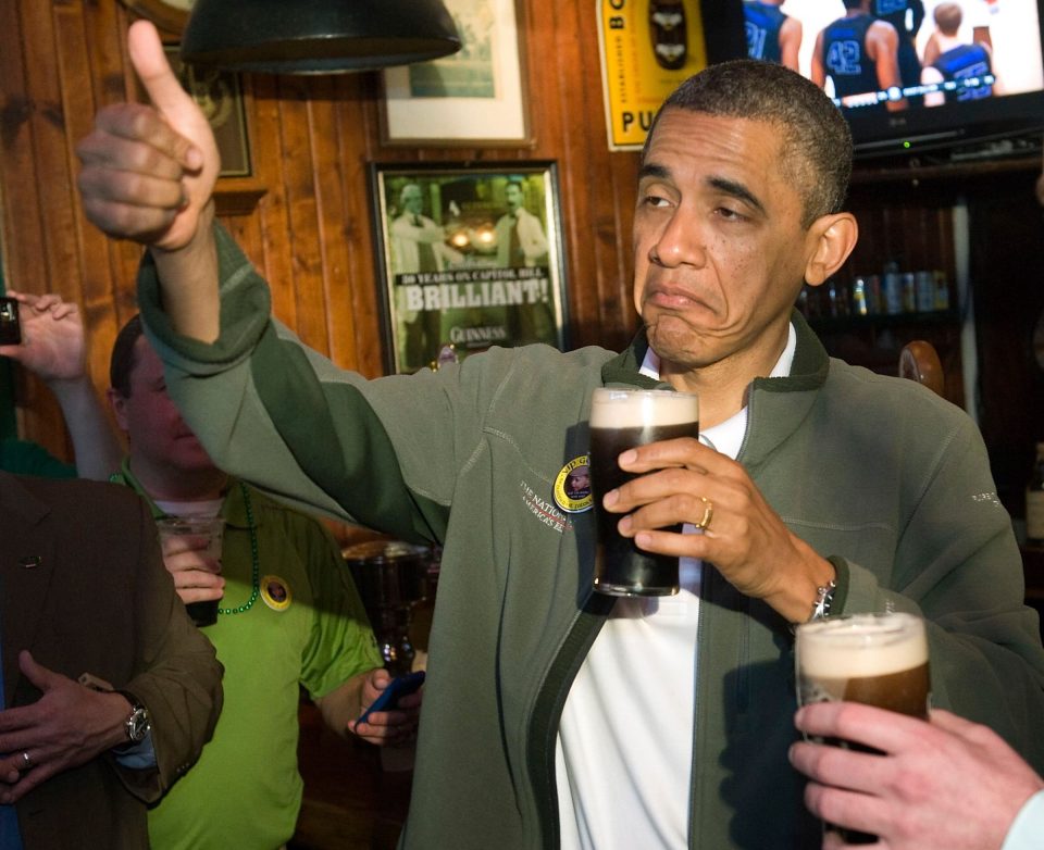  Barack Obama gives a thumbs-up as he celebrates St. Patrick's Day with a pint of Guinness like a lad