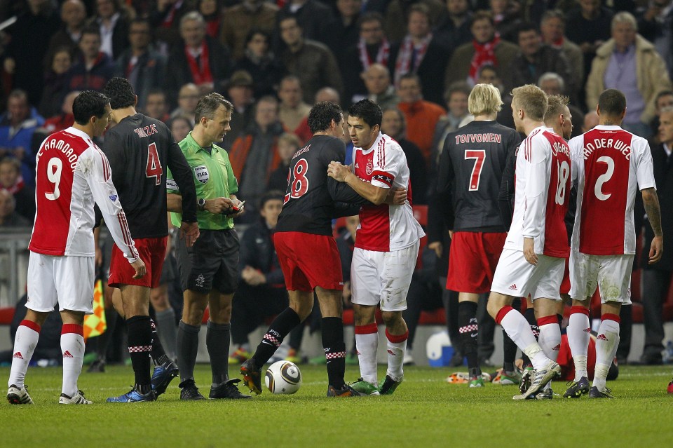  It was all just a big argument between Ajax and PSV player - before Suarez took it to another level