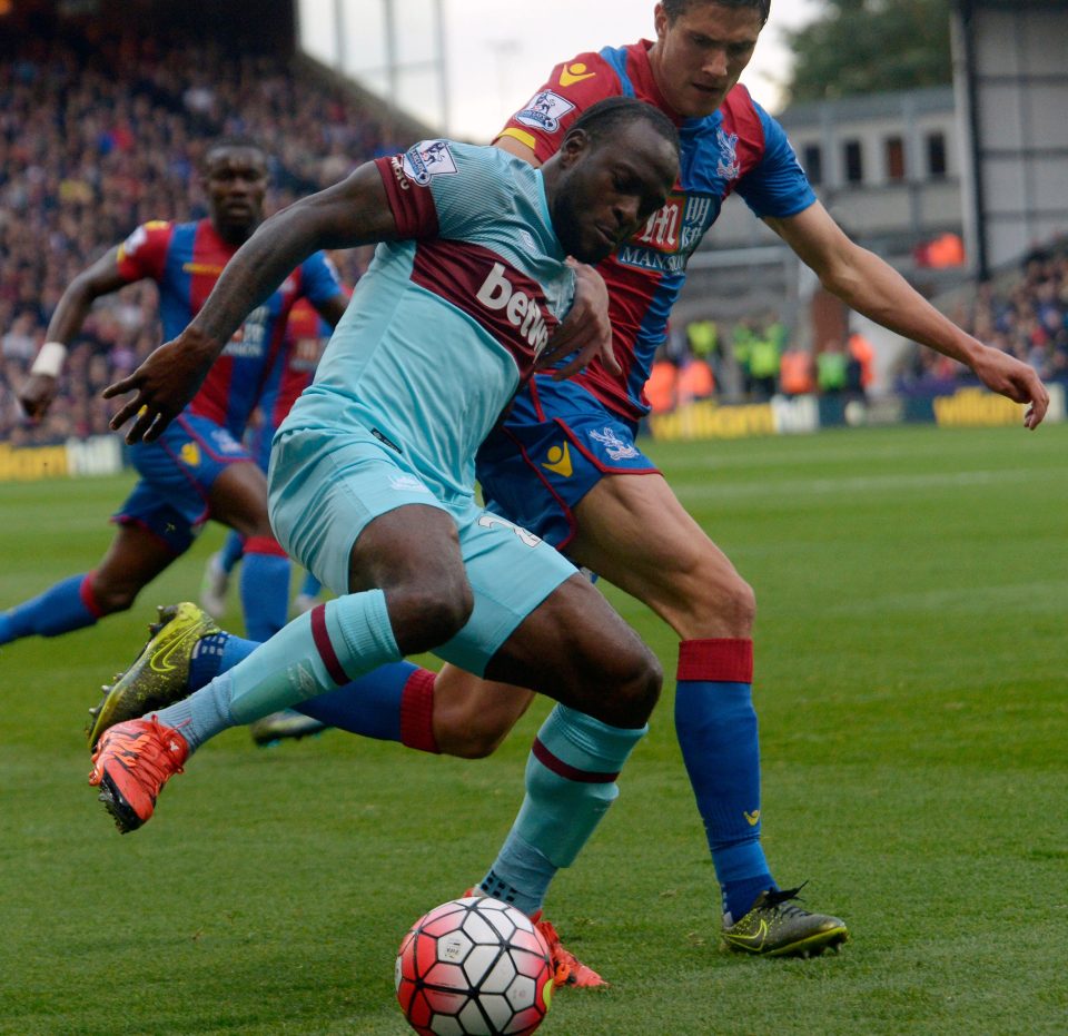  Victor Moses, on loan at West Ham, takes on Crystal Palace's Martin Kelly